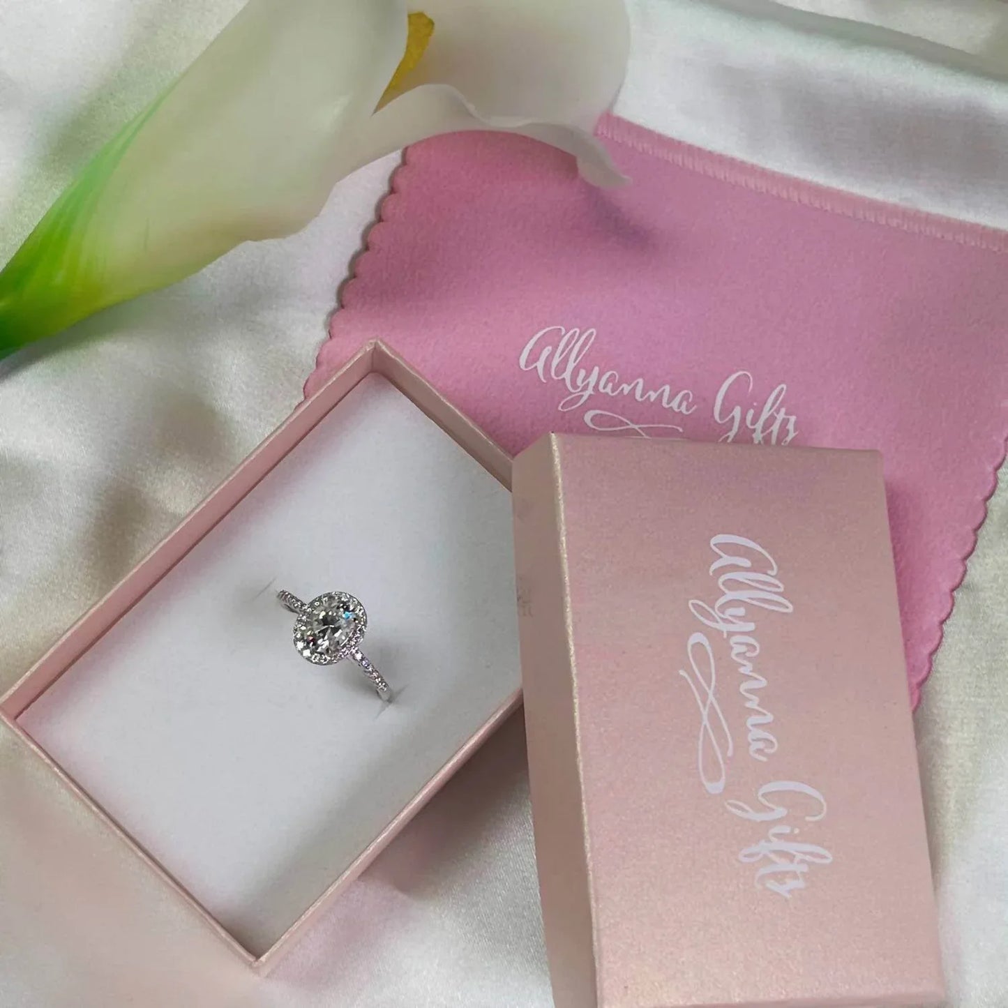 Allyanna Gifts - Women's Oval Moissanite With Halo Ring - Rack Hunt