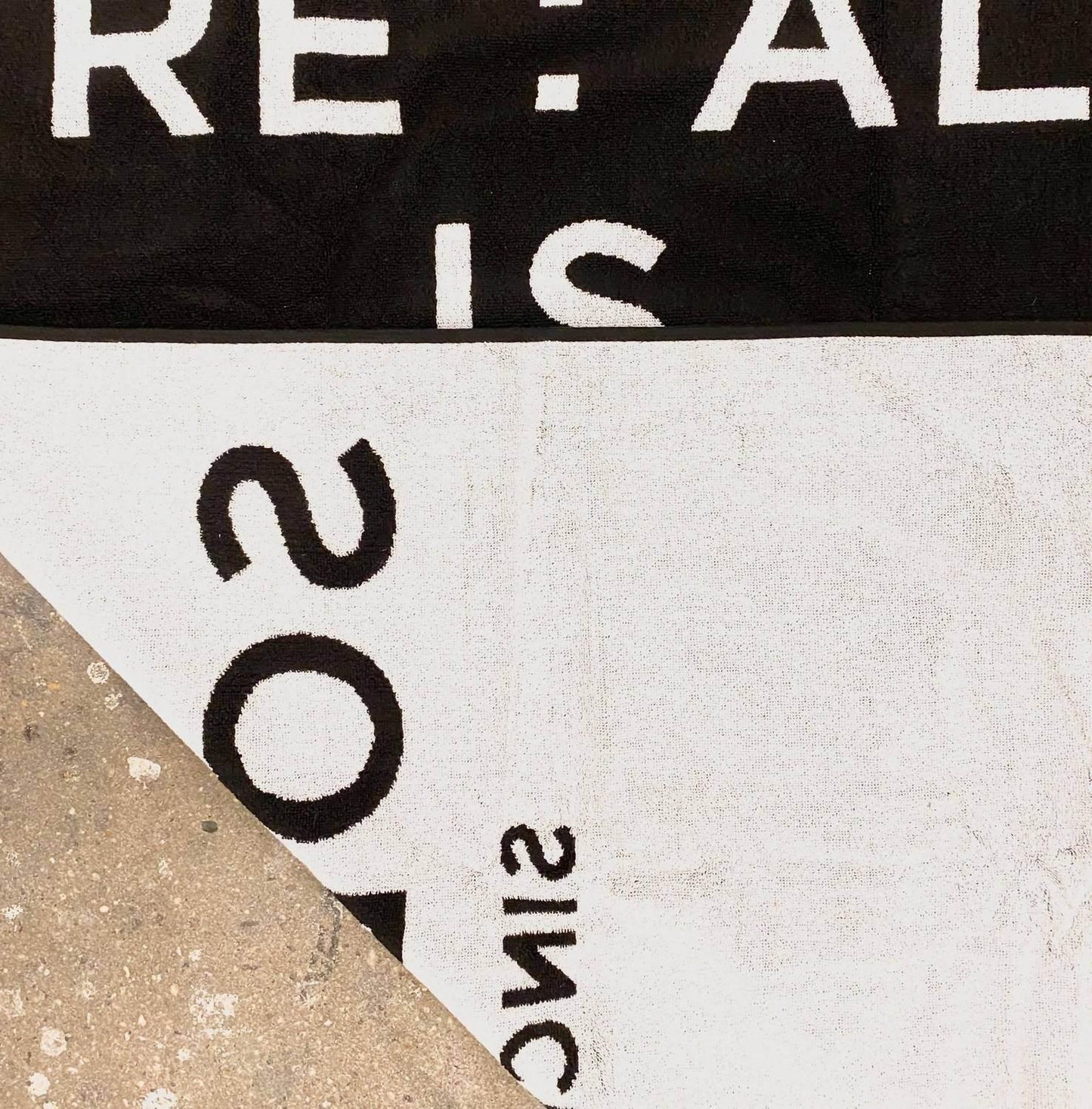 THE SOLOIST X RE:AL - Luxurious Double Looped Beach Towel - Rack Hunt