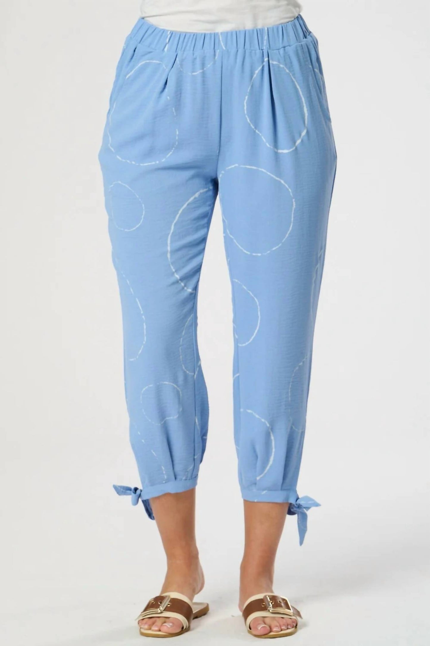 Elastic waist pants with ties at calves
