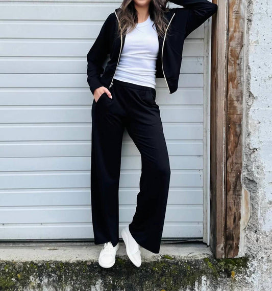 Elastic Knit Trousers With Pockets