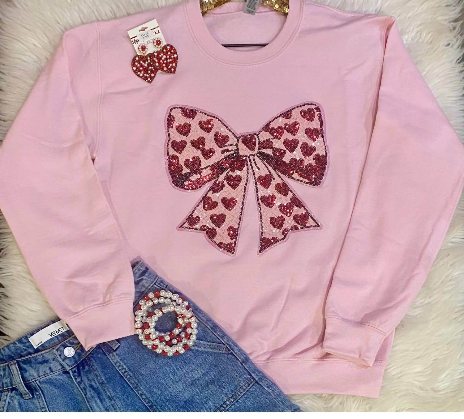 Trendy Tee Co. - Heart Bow Sequin Sweatshirt - Rack Hunt -