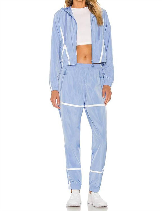 ADAM SELMAN Sport Women's Windbreaker Taped Trackpants in Powder Blue