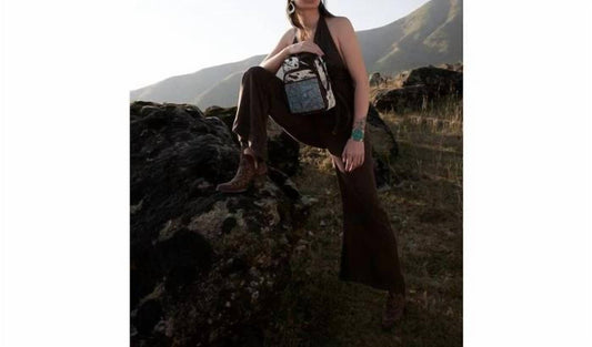 Delilah Creek hand to Backpacks