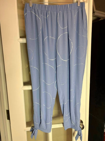 Elastic waist pants with ties at calves