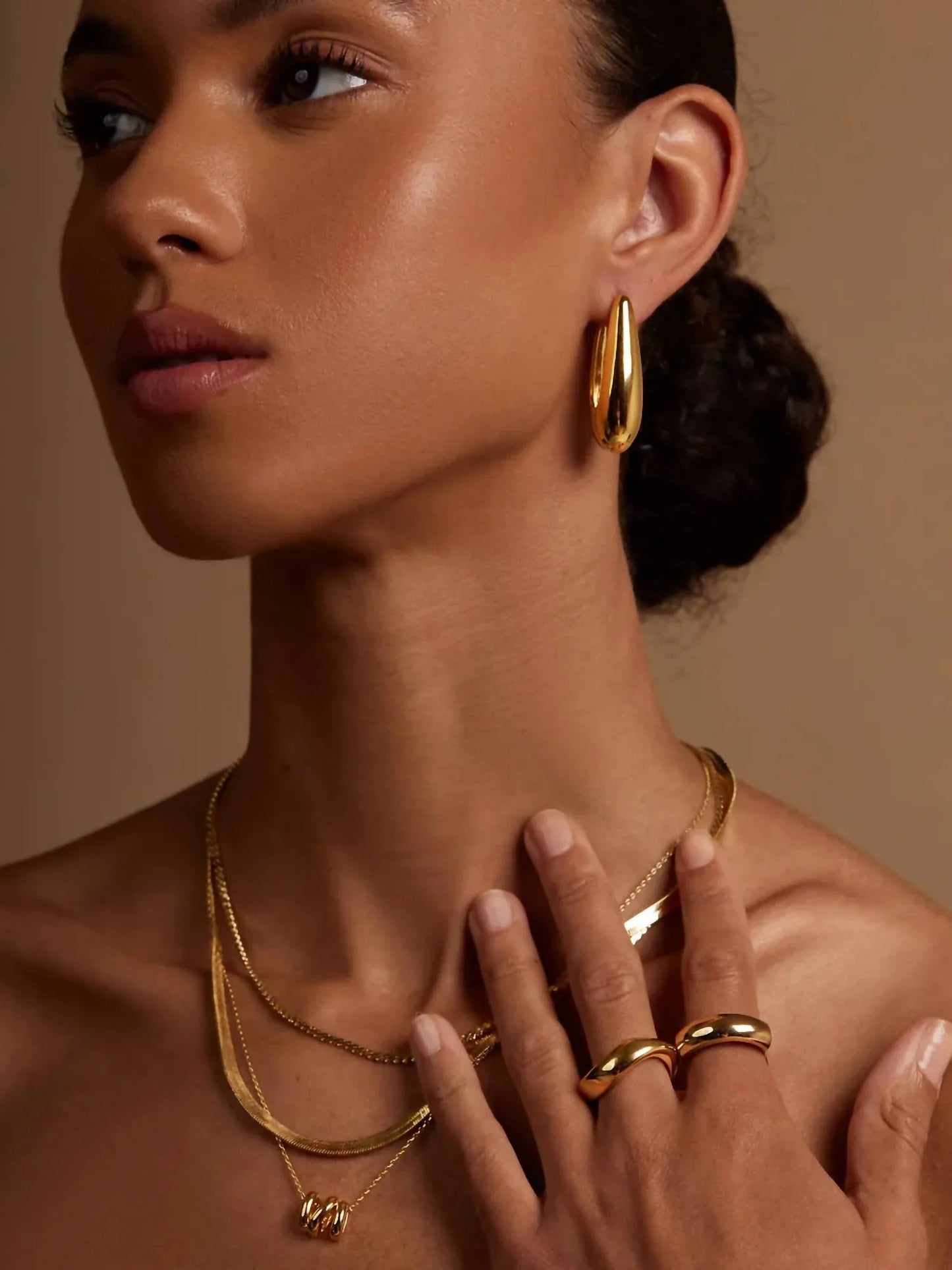Rho - Women's Mega Teardrop Hoop Earring - Rack Hunt