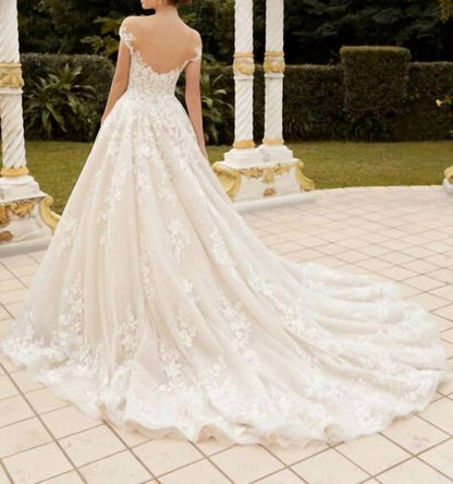 Haven Cap Sleeve Plunging Neck Wedding Gown