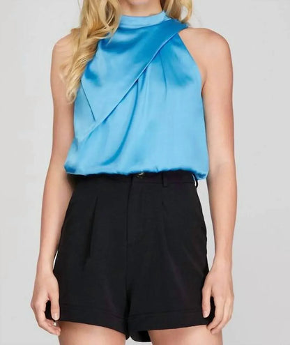 AMERICAN FIT - Clare Mock Nek Sleeveless Asymmetrical Woven Top - Rack Hunt