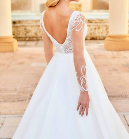 Sheer Sleeve Plunging Neckline Wedding Dress