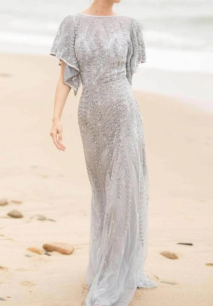 Trailing Beaded Evening Gown